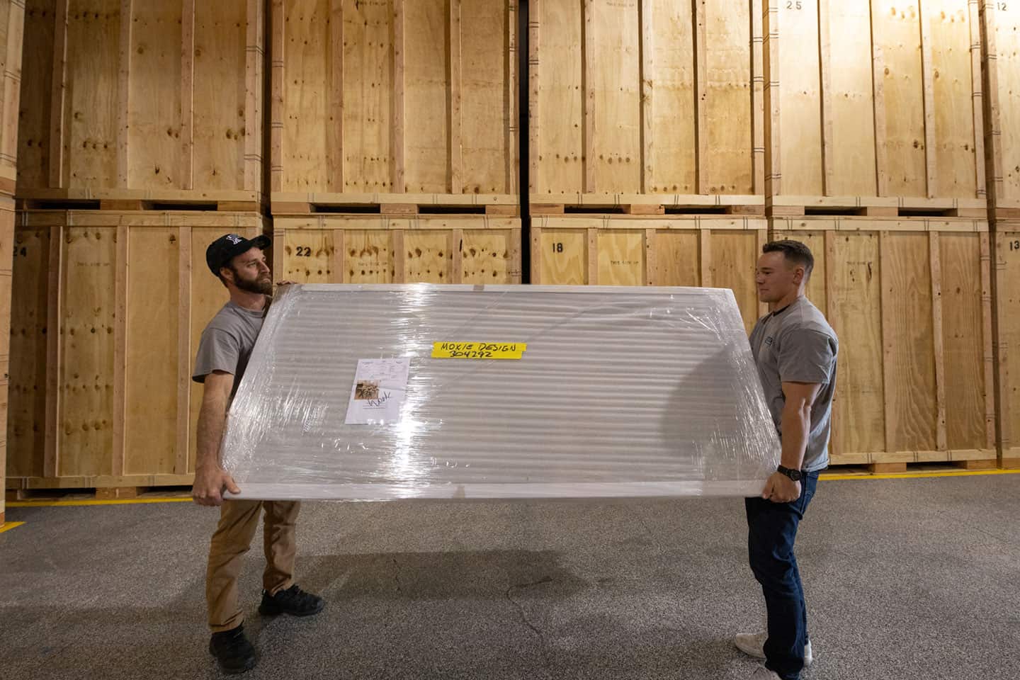 Tahoe Moving warehouse moving Image of Tahoe Moving Company crew moving inside a warehouse.
